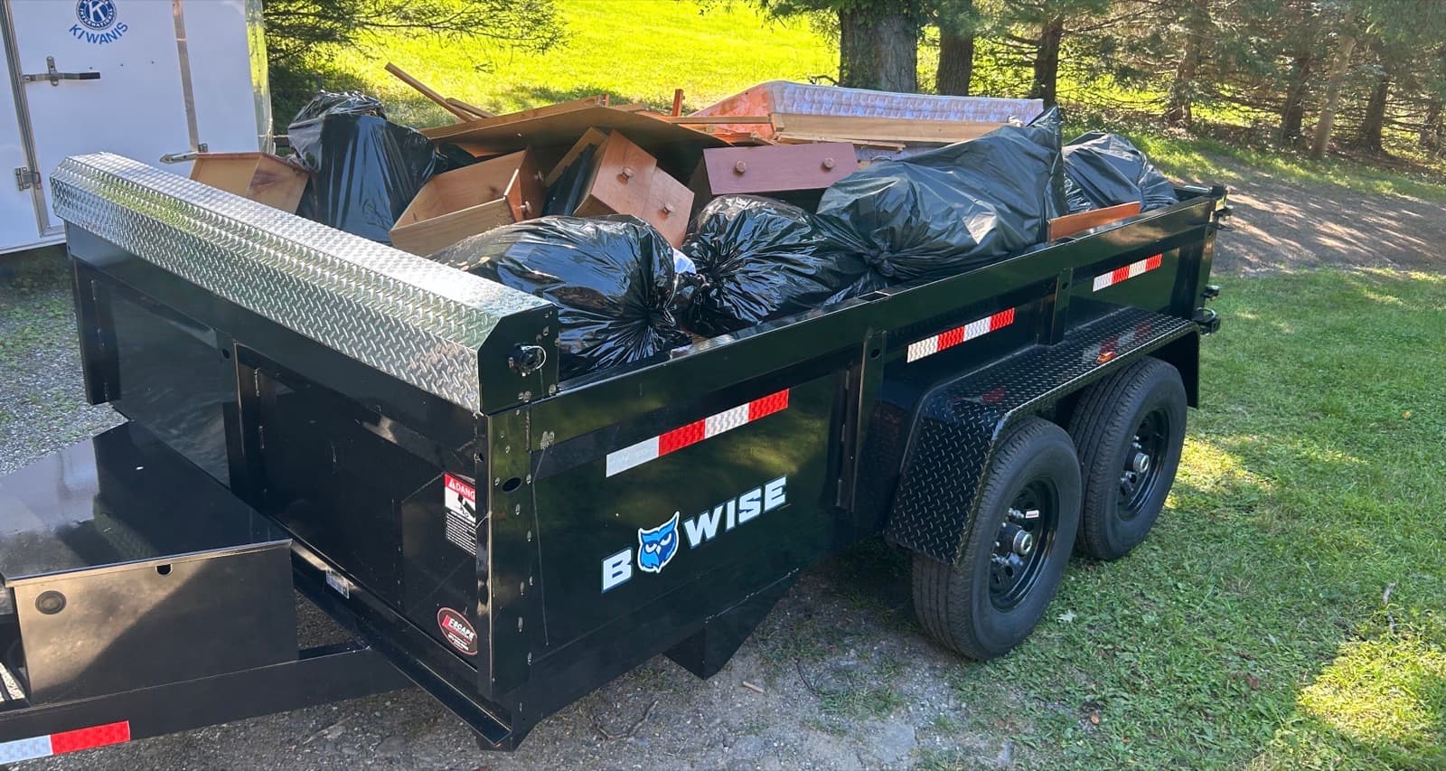 Fully loaded dump trailer after a property cleanout